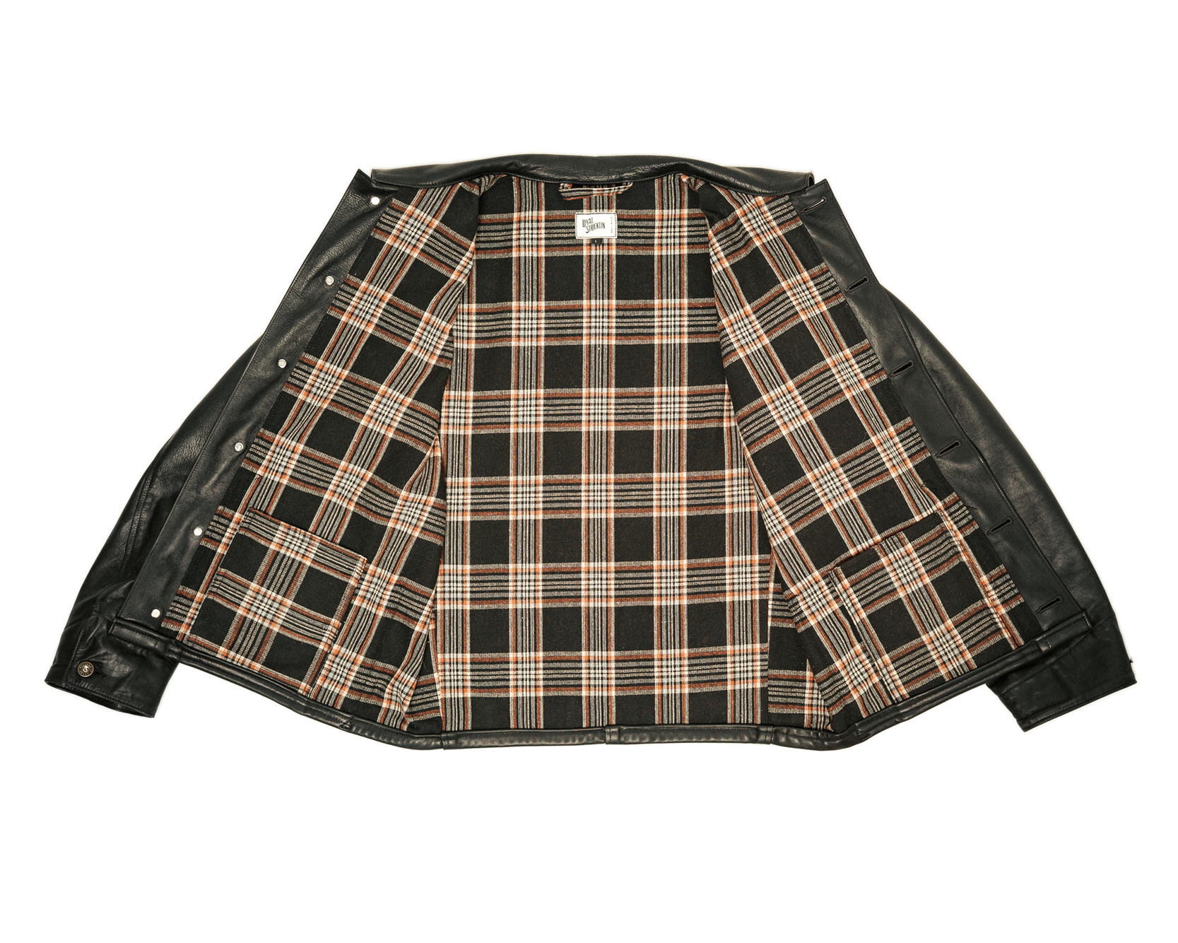 Plaid jacket with black leather sleeves on a white background